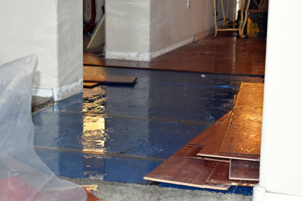 Professional Flood Damage Repair technician working in Oaks, OK